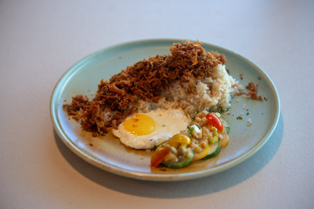 Rice topped with stir-fried pork and fried egg, Thai foodの写真素材