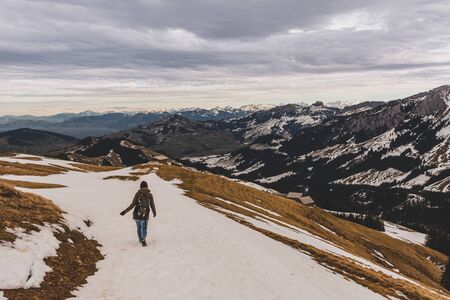 two women hiking in the beautiful swiss mountains - Kronberg Appenzell Switzerland Europeの写真素材