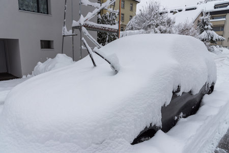 Sankt Gallen, Switzerland - January 15, 2021: Parked cars buried in snowのeditorial素材