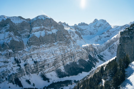 Beautiful sunny snowy mountain landscape on Ebenalp in Appenzellの写真素材