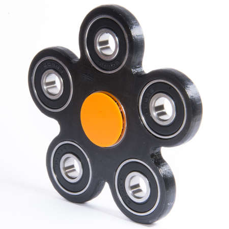 Fidget spinner to relax, relieve stress, playの写真素材