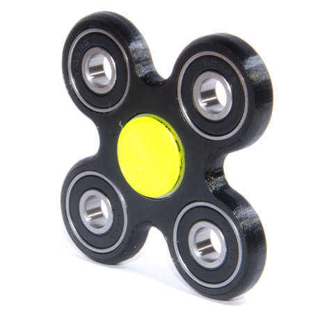 Fidget spinner to relax, relieve stress, playの写真素材