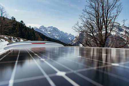 Solar panels on a roof of a camping van - self-sufficient campingの写真素材