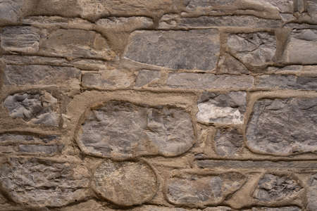 Stone wall structure of an old houseの写真素材