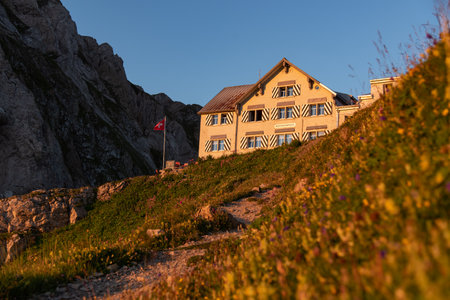 Appenzell, SWITZERLAND - August 9, 2020: Mountain inn Rotsteinpass at sunsetのeditorial素材