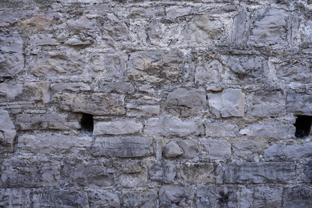 Stone wall structure of an old houseの写真素材