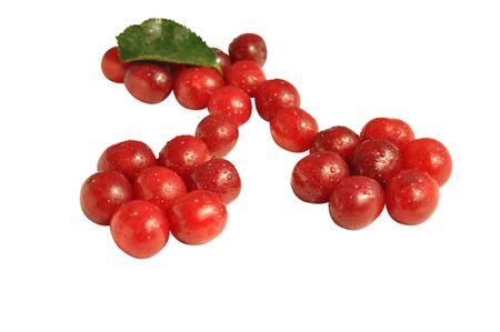fresh red cherries with leaf isolated on whiteの写真素材
