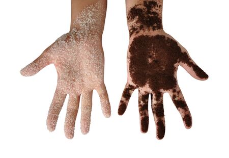 coffee and sugar on hands isolated on whiteの写真素材