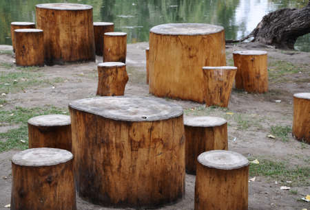 Tables and chairs in evening parkの写真素材