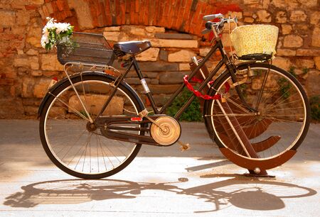 A new bicycle parking on the background wallの写真素材