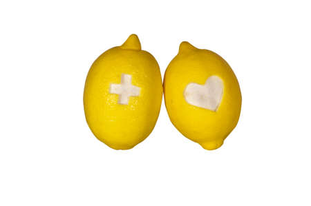 two ripe lemons isolated on whiteの写真素材