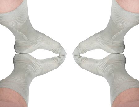reflection of male legs isolated on whiteの写真素材