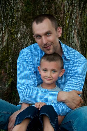portrait of father and son in parkの写真素材