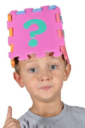 little boy and query mark isolated on whiteの写真素材