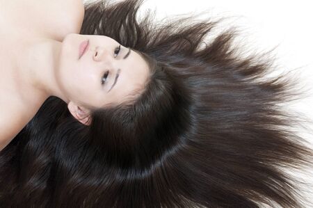 young woman with beautiful hairの写真素材
