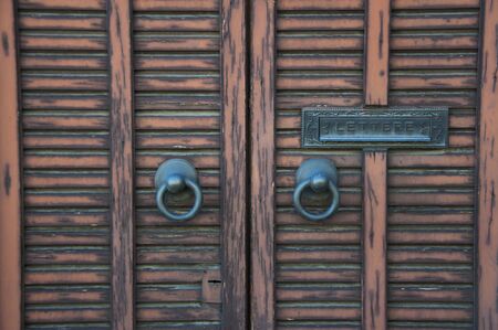 Part of vintage door with a mailbox, Italyの写真素材