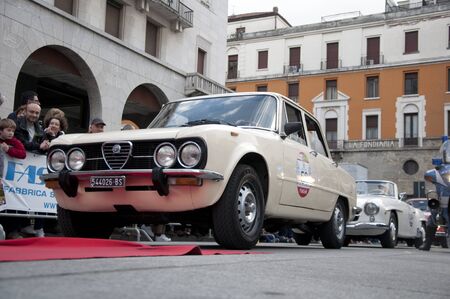 BRESCIA, ITALY - April 17, 2016: 500 Miles. Finish. ALFA ROMEO GIULIA SUPER 1300, built 1970のeditorial素材