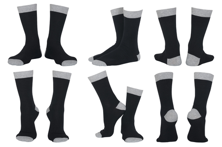Set of male black socks in different poses isolated on whiteの写真素材