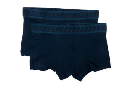 two blue boxers for a boy isolated on white backgroundの写真素材