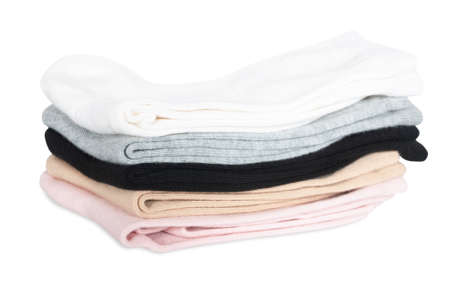stack of womens socks in different colors isolated on whiteの写真素材
