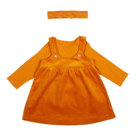 mustard color babygirl sundress with t-shirt and headband isolated on whiteの写真素材