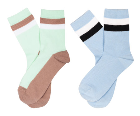 green and blue socks with lines isolated on white backgroundの写真素材