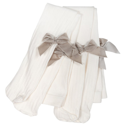 pair of white tights for girls with bows isolated on white backgroundの写真素材