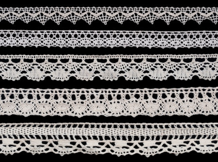 white vintage macrame lace isolated on black backgroundの写真素材