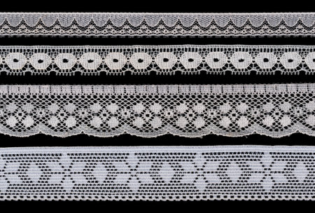 white geometric lace isolated on black backgroundの写真素材