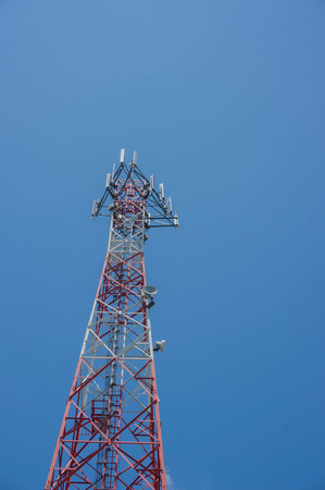 view of telecommunications towers against the sky.の写真素材