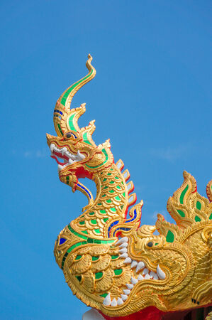 Thai temple. Decorated with Naga at the end of the roofの写真素材