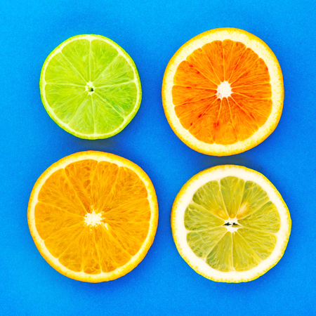 Citrus fruits slice. Juicy slice of lime, lemon, orange background.の写真素材
