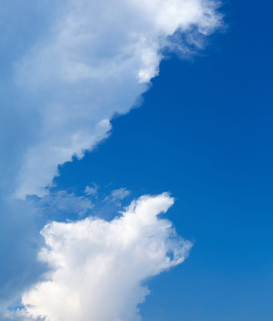 Blue sky background with clouds. Sky with Clouds in a sunny day. Cumulus Clouds