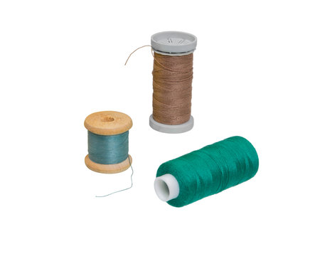 Spool thread collection, isolated on white background. Set of different sewing spool with threads.