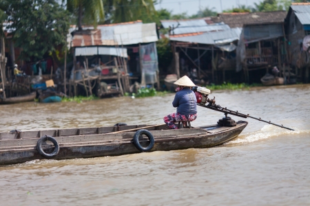 Mekong Delta, Cai Be District, Tien Giang Province, Cai Be Town, Cai Be Floating Market, South Vietnam, local people on December 10, 2013  Cai Be Market is one of most famous floating market in Vietnamのeditorial素材