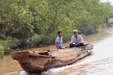 Mekong Delta, Cai Be District, Tien Giang Province, Cai Be Town, Cai Be Floating Market, South Vietnam, locals at the market on December 10, 2013  Cai Be Market is one of most famous floating market in Vietnamのeditorial素材