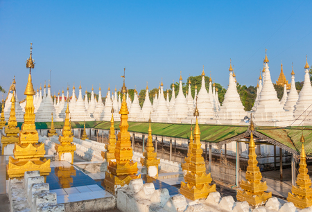 Sandamuni Pagoda in Mandalay, Myanmar. Central pagoda surrounded by 1774 white shrines, each housing a single marble slab with the teachings of the Buddha and located southwest of Mandalay Hill.のeditorial素材