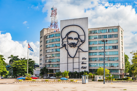 Havana, Cuba-07 October, 2017. Ministry of the Comunications building with face of Camilo Cienfuego at the Revolution Square on October 07, 2017 in Havana, Cuba.のeditorial素材