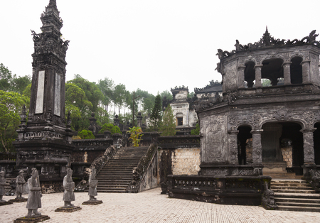 Hue, Vietnam. Royal Khai Dinh Tomb complex from salutation court with Emperor's honor guard, Stele House, one of two Obelisks and stairs leading to the Thien Dinh Palace where Khai Dinh Emperor is buried.のeditorial素材