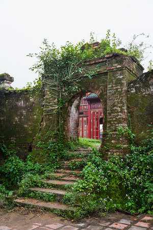 Hue, Vietnam. Old ruins left from buildings of the royal city at the garden inside of Imperial Forbidden city complex in Citadel.の写真素材