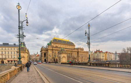 Prague, Czech Republic-January 31, 2019. Legions Bridge and view of the road at Old Town part with historical buildings and Prague National Theatre on January 31, 2019.のeditorial素材