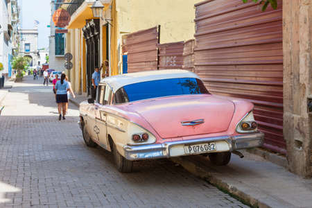 Havana, Cuba-October 7, 2016. Old, long time used and rusty classic American car on the street of Old Havana on October 7, 2016 in Cuba.のeditorial素材