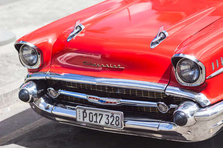 Havana, Cuba-October 09, 2016. Front of old style, classic, vintage, red American car on October 09, 2016 at historical Old Havana in Cuba .のeditorial素材