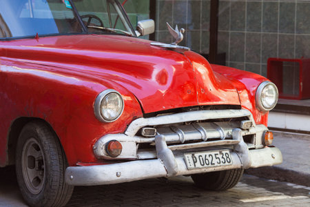 Havana, Cuba-October 08, 2016. Front of old style, classic, vintage, red American car on October 08,...