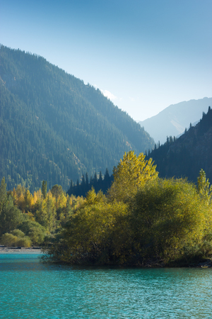 vertical shot of Kazakhstan mountain Lake, Esik city, Autumnの写真素材