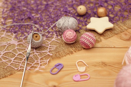 Colorful yarn, crochet hook on wooden backgroundの写真素材