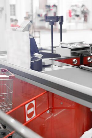 Empty cash desk with closed way border in supermarketの写真素材