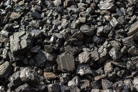 Pile of natural black hard coal for texture background. Grade anthracite coals often referred to as stone coal and black diamond coal.の写真素材