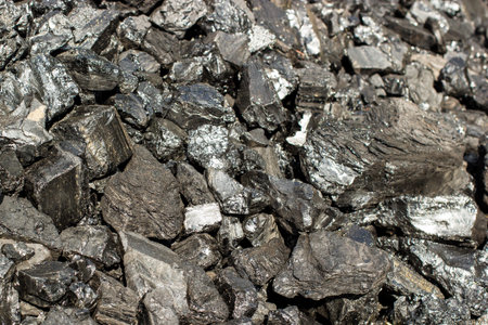 Pile of natural black hard coal for texture background. Grade anthracite coals often referred to as...