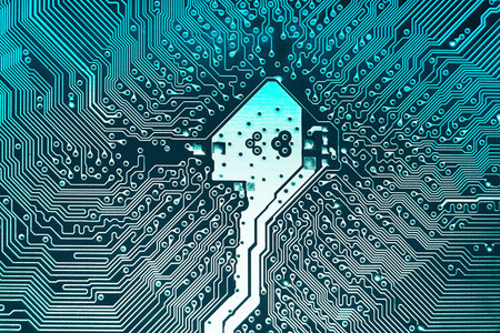 Blue electronic motherboard circuit close up macro background.